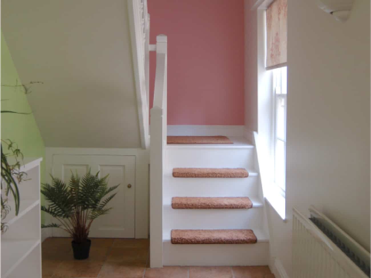 holiday home design in warwickshire dulux pink staircase wall seasonal soul home