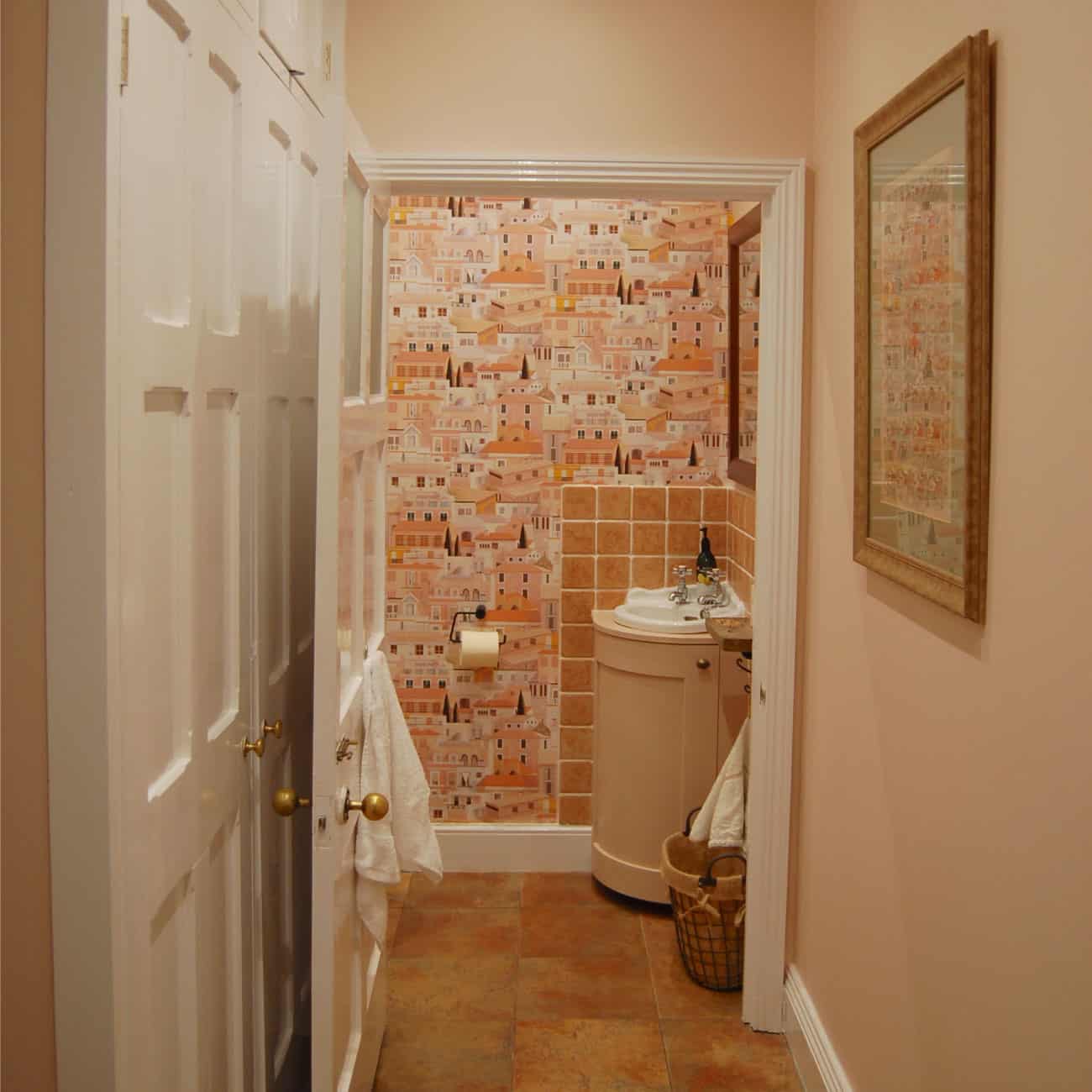 rustic cloakroom toilet design in dusky pink