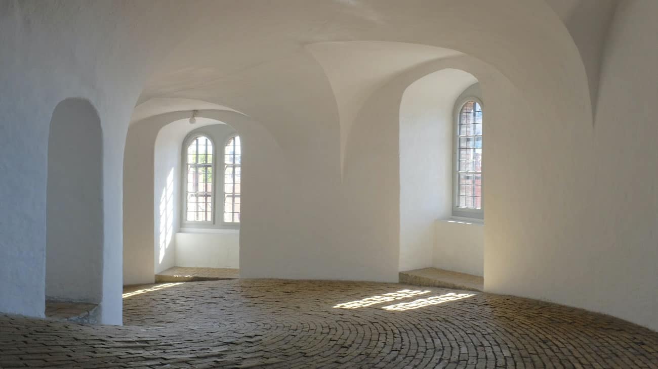 minimalist design with arches and curved window detail