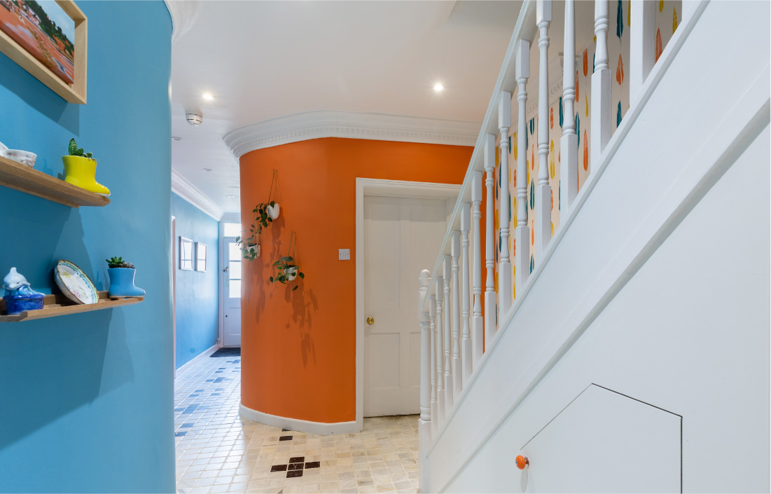hallway design in cheltenham gloucestershire blue wall by seasonal soul home